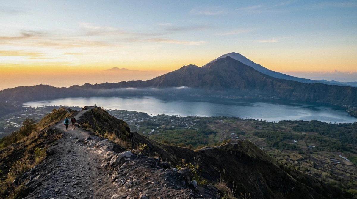 Clear dry-season sunrise over Lake Batur, the best time to hike Mount Batur, Kintamani, Bali
